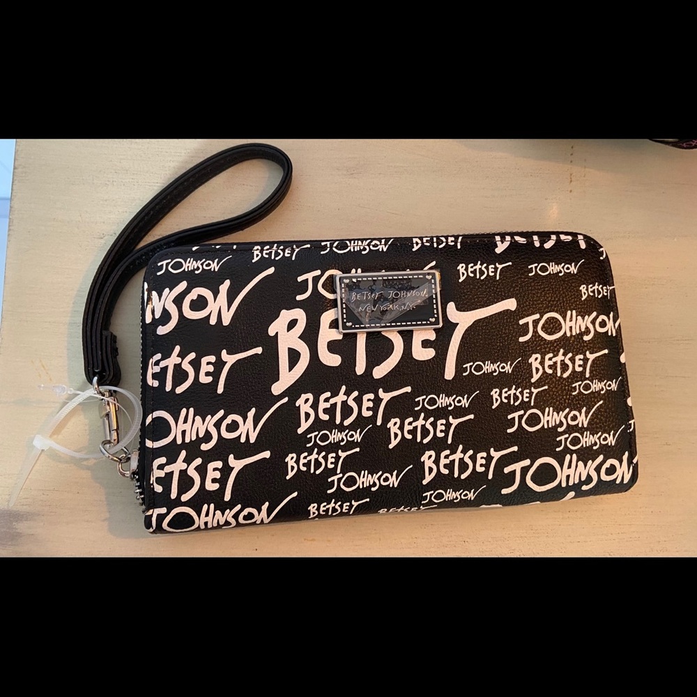 New without tags Betsey Johnson zip around wallet.